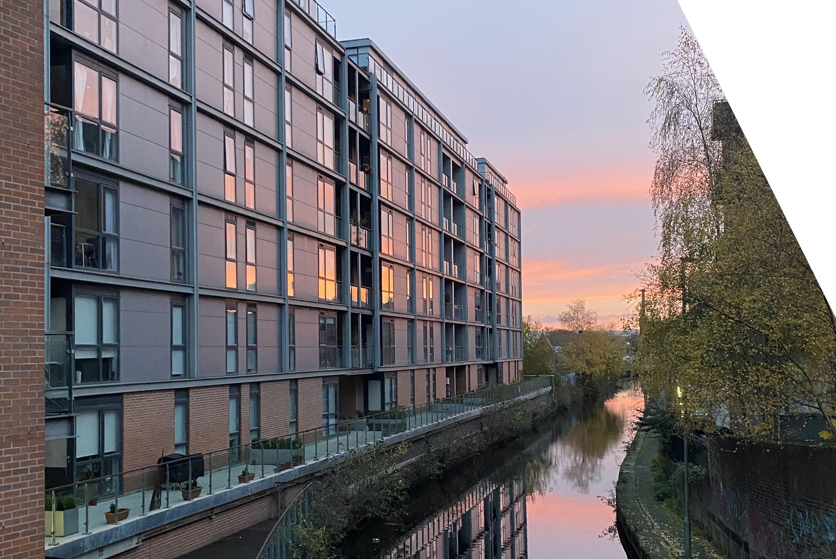 sunset over the manchester canals in ancoats at flint glass wharf